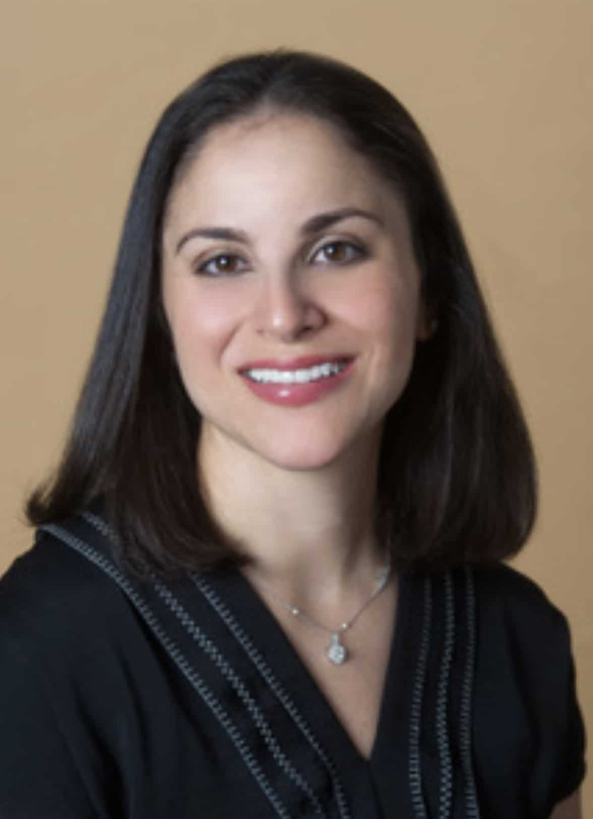 a woman smiling for the camera